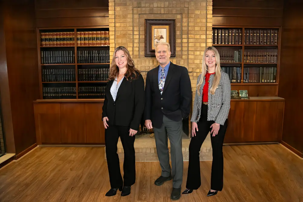 Picture of Springer Lyle & Dameron's attorneys, Aubry Dameron, Frank Lyle and Darby Dean.